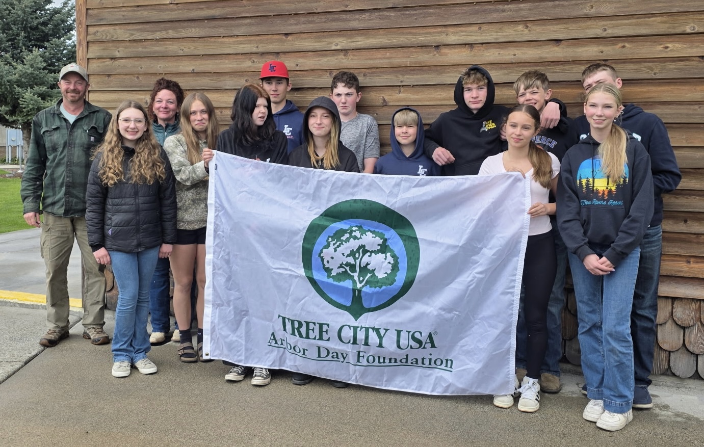 NHS Freshmen help Mayor Tyler Nelson plant trees for Arbor Day. NHS Freshmen help Mayor Tyler Nelson plant trees for Arbor Day.