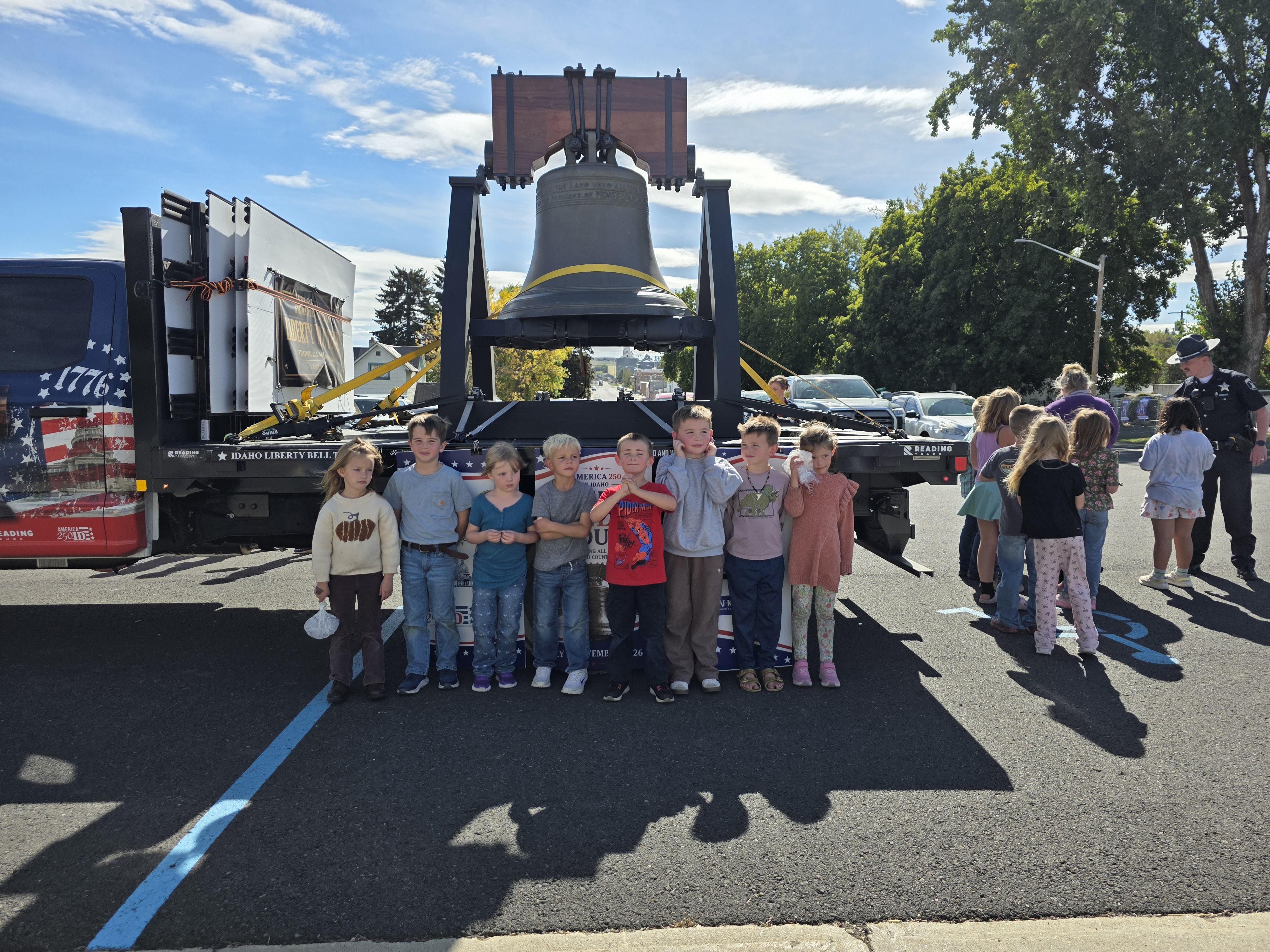 School kids pose in front of Idaho's Liberty Bell. School kids pose in front of Idaho's Liberty Bell.