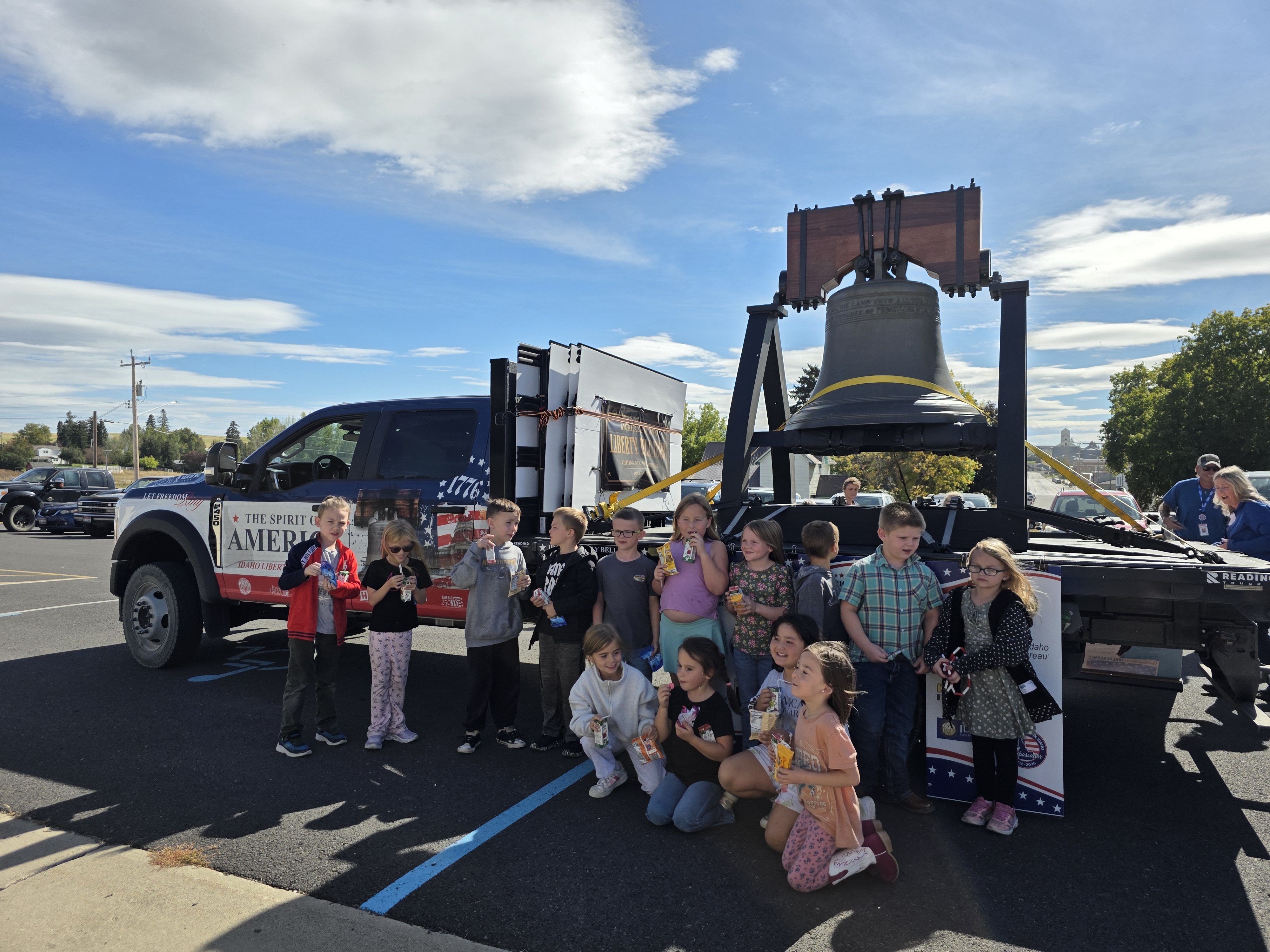 School kids pose in front of Idaho's Liberty Bell. School kids pose in front of Idaho's Liberty Bell.