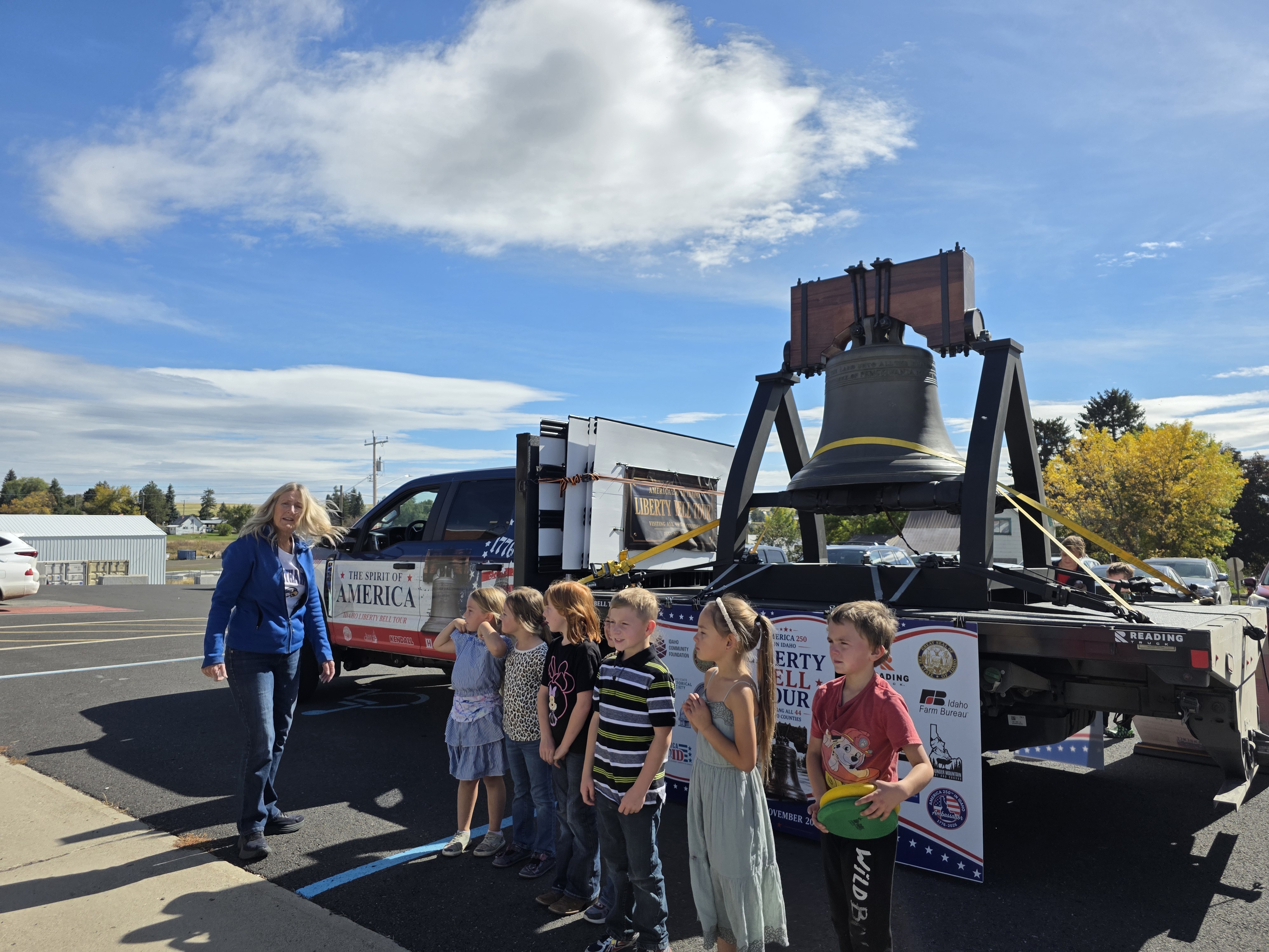 School children pose in front of Idaho's Liberty Bell. School children pose in front of Idaho's Liberty Bell.