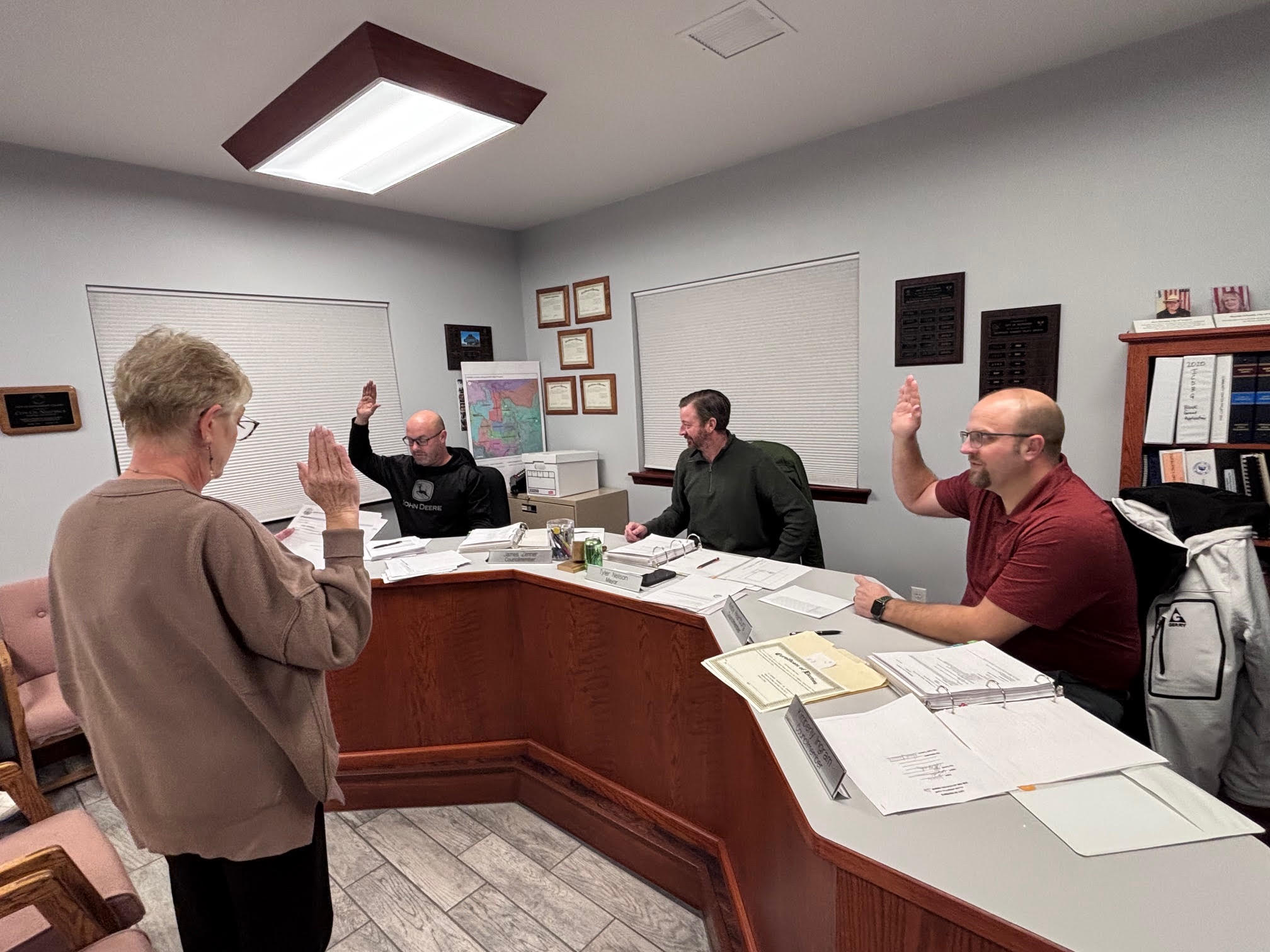 City Clerk Rhonda Schmidt swears in Mike Jensen and Kelby Heartburg at the Jan. 12 meeting of the Nezperce City Council. 